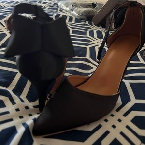 Black closed toe pumps